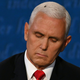 Vice-President Mike Pence and a friend during Wednesday night’s debate.